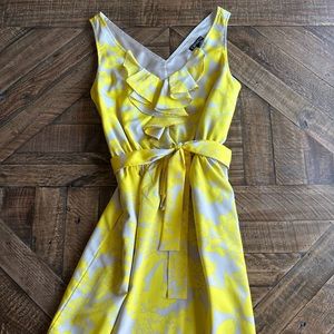 Yellow floral mini dress with empire waist